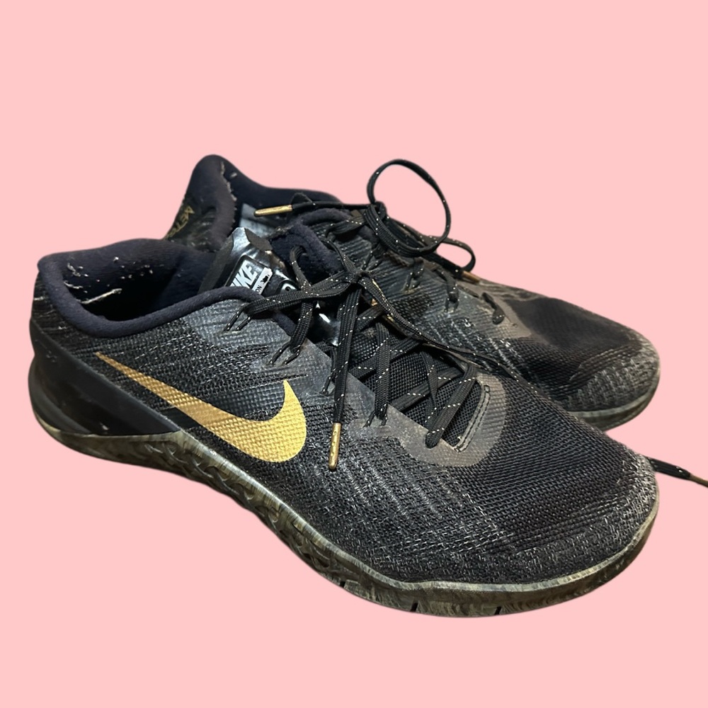 Nike Black Sneakers with Gold Accents